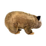 Plush toy resembling a brown animal on a white background