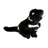Plush toy otter on a white background