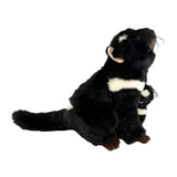 Plush toy skunk on a white background