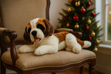 St. Bernard realistic plush toy lying on a chair