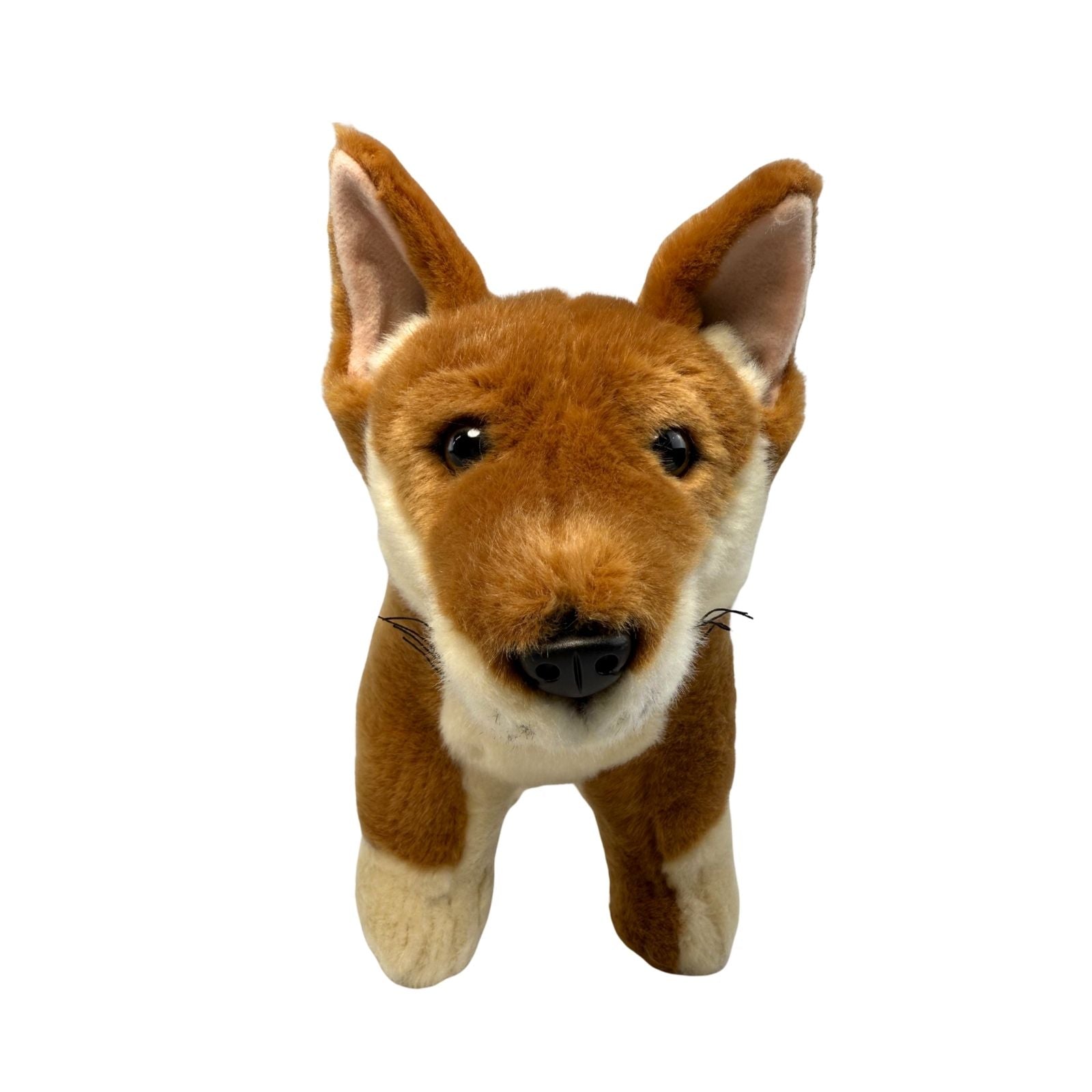 Stuffed animal toy resembling a dingo on a white background