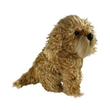 Side view of sitting brown Oodle plush dog toy