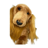 Lexie Cocker Spaniel plush toy with golden‑brown fur tilting head forward.