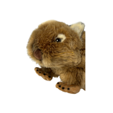 Plush toy resembling a Wombat on a white background
