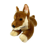 Plush toy dog with brown and white fur on a white background