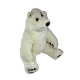 Minka polar bear plush toy sitting angle view