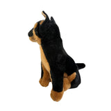 realistic soft plush toy black and tan dingo in a sitting position