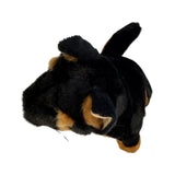 realistic soft plush toy black and tan dingo in a sitting position