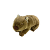 A plush toy resembling a sleeping wombat with brown acrylic fur, white inner ears, and a pink nose.